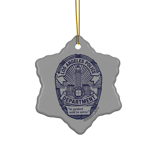 Glossy ceramic LAPD badge ornament with a gold string against a neutral background-0
