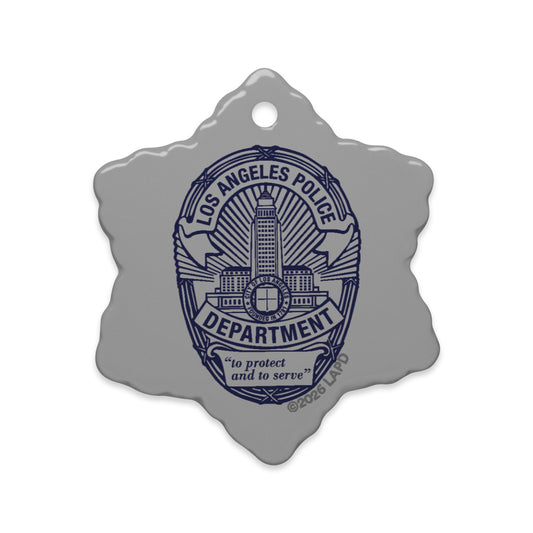 Glossy ceramic LAPD badge ornament with a gold string against a neutral background-1