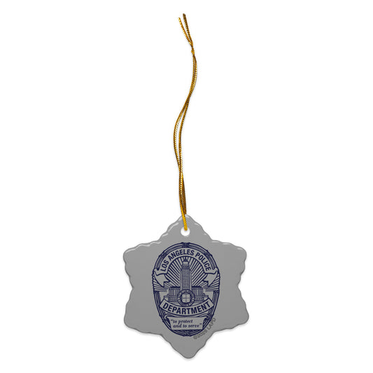 Glossy ceramic LAPD badge ornament with a gold string against a neutral background-2
